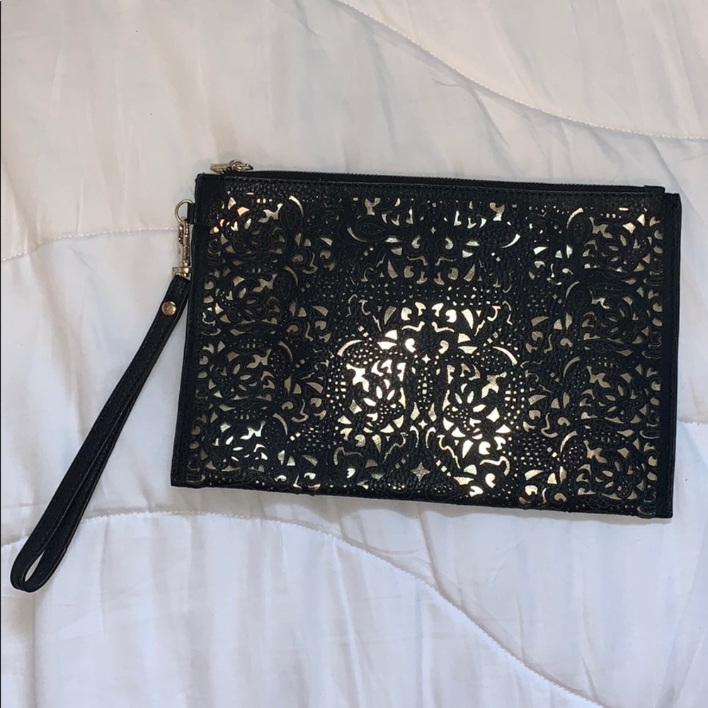 Call it Spring Clutch Wristlet